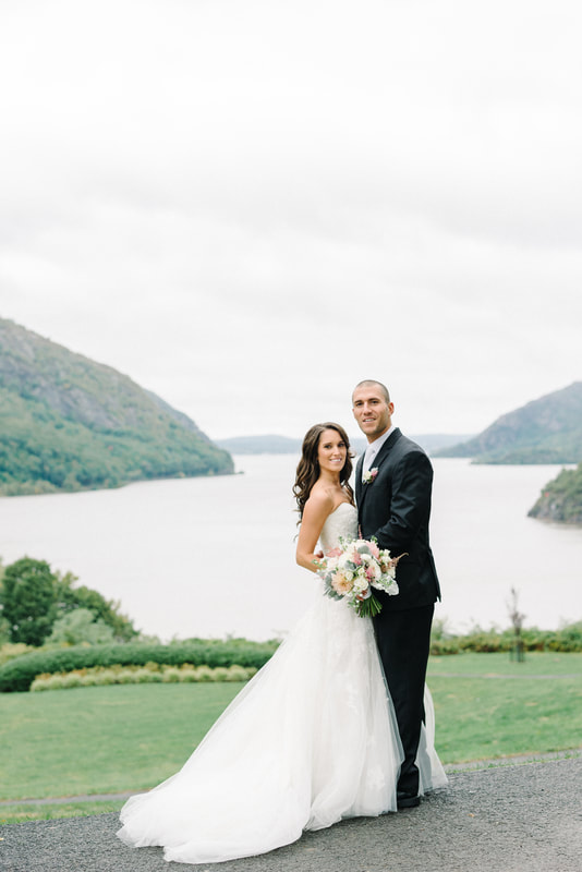 Bride and groom by the Hudson