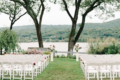 Outdoor wedding ceremony at The Thayer Hotel, with the Hudson River in the background