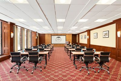 Conference room lined with tables
