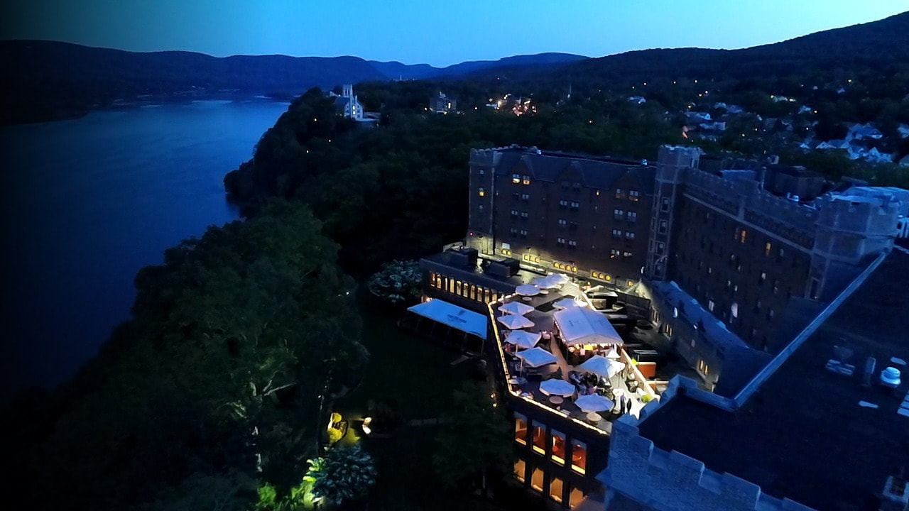 Drone photo of the exterior of The Thayer Hotel at night